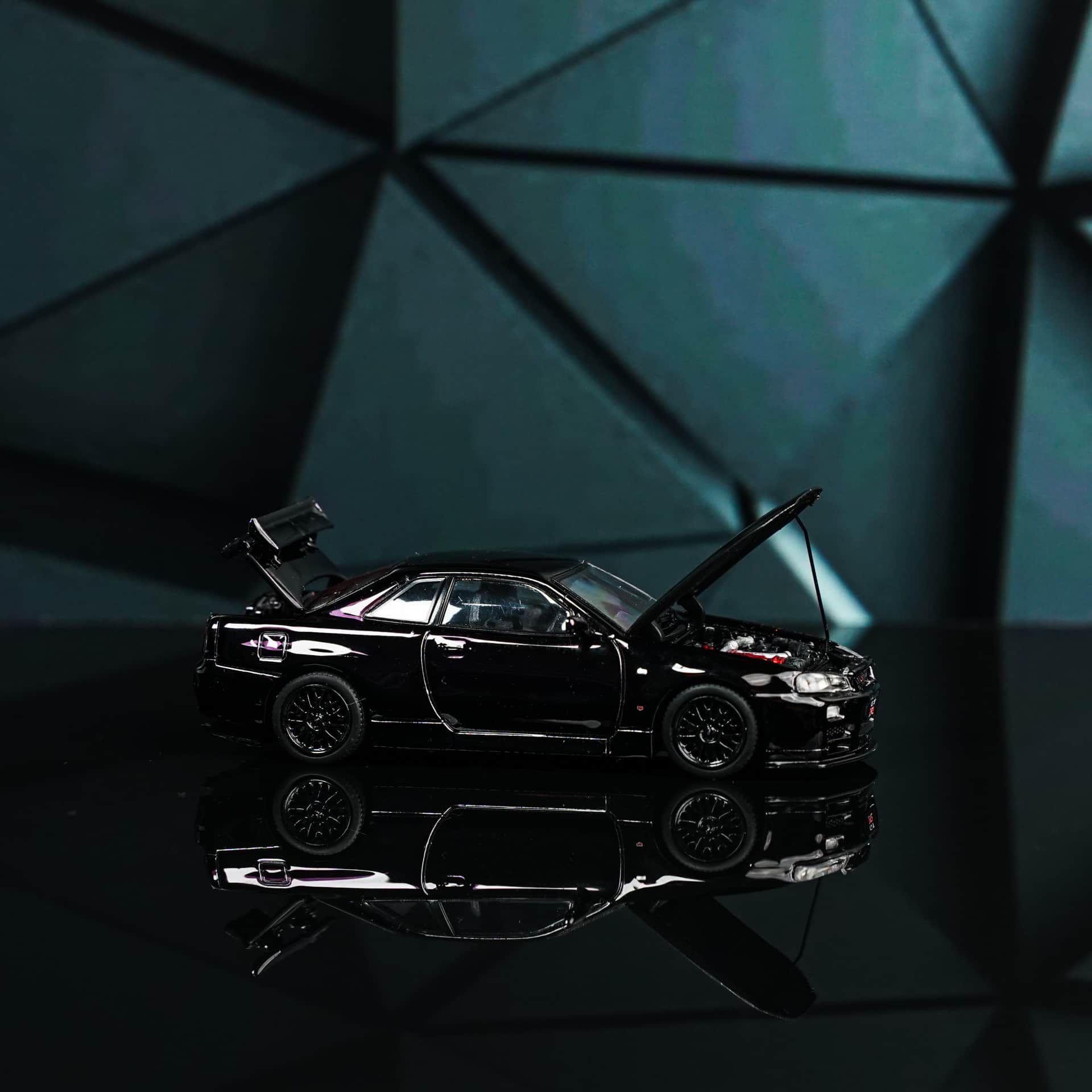 Nissan GTR 34 Black Aurora Model - model 1:64