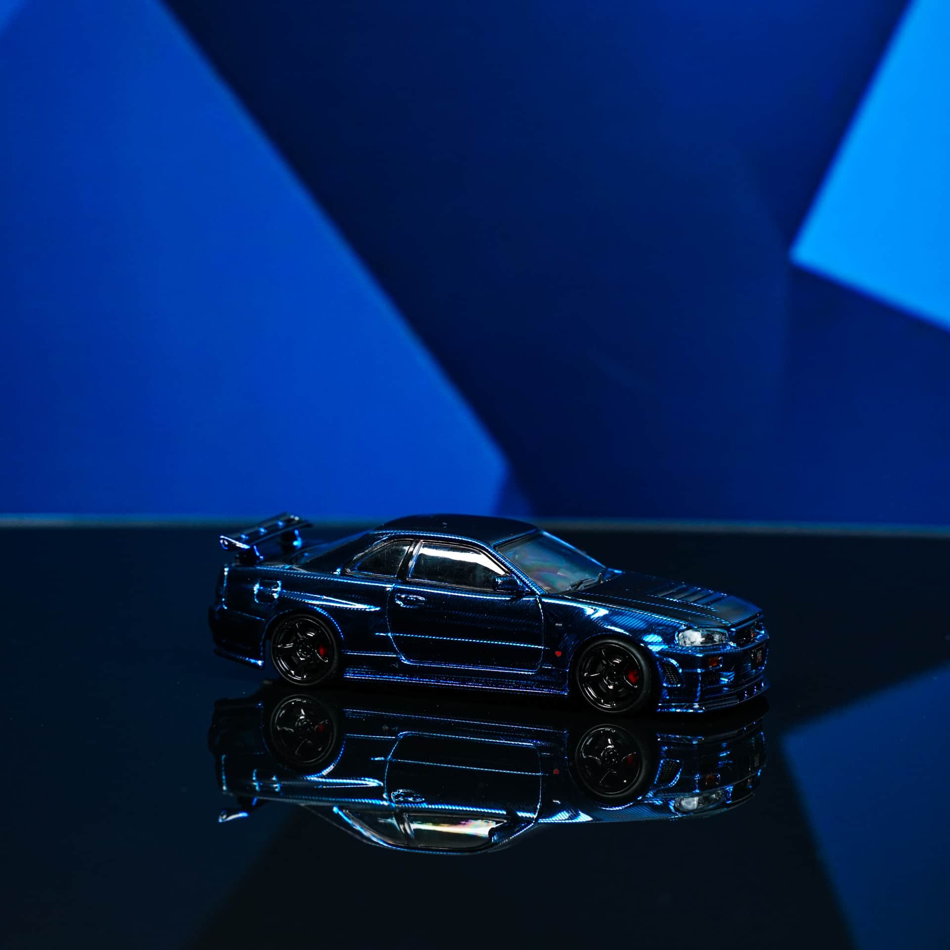 Nissan GTR R34 Blue Carbon TimeTop - model 1:64