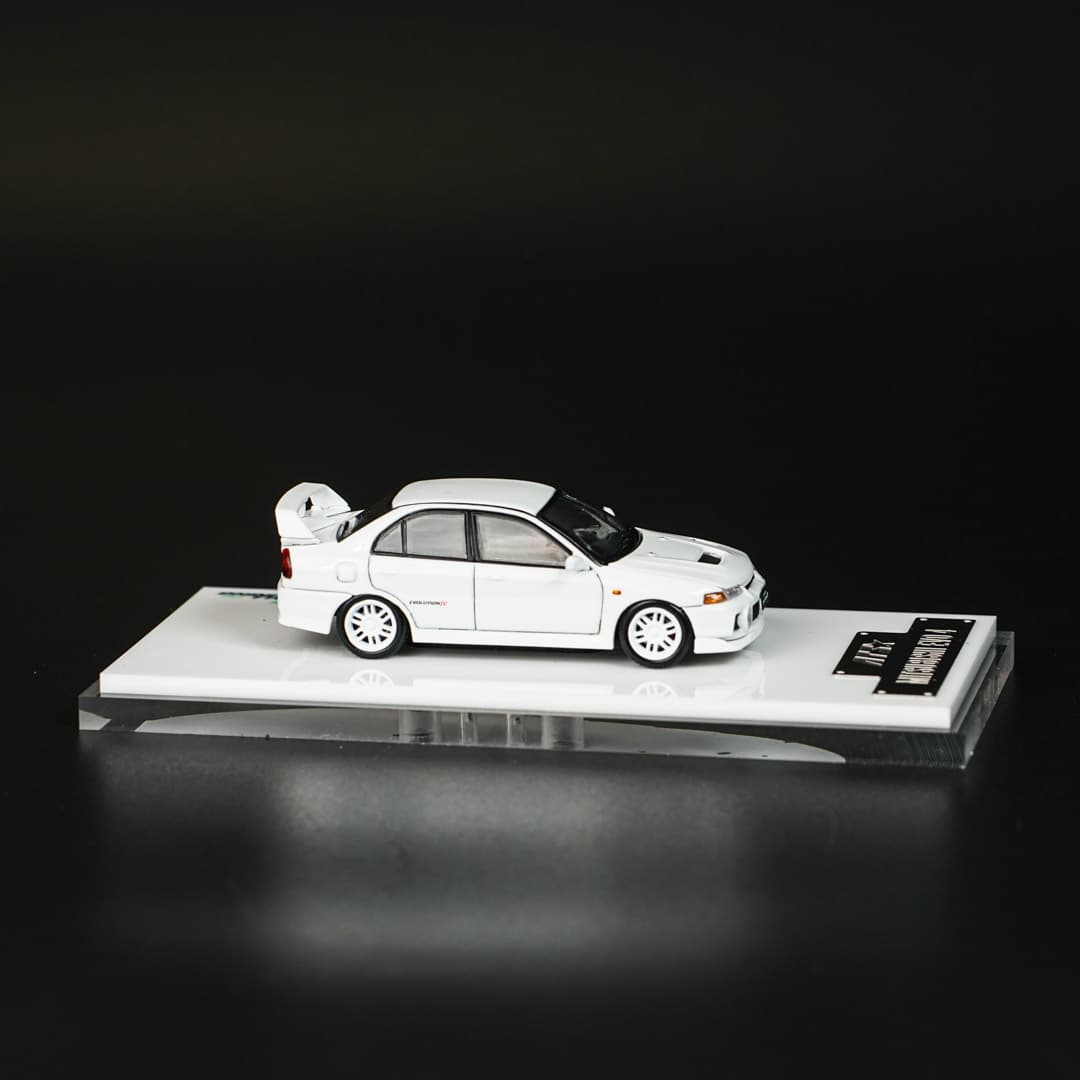 Mitsubishi Evo 4 ATS - model 1:64 - miniatura 2