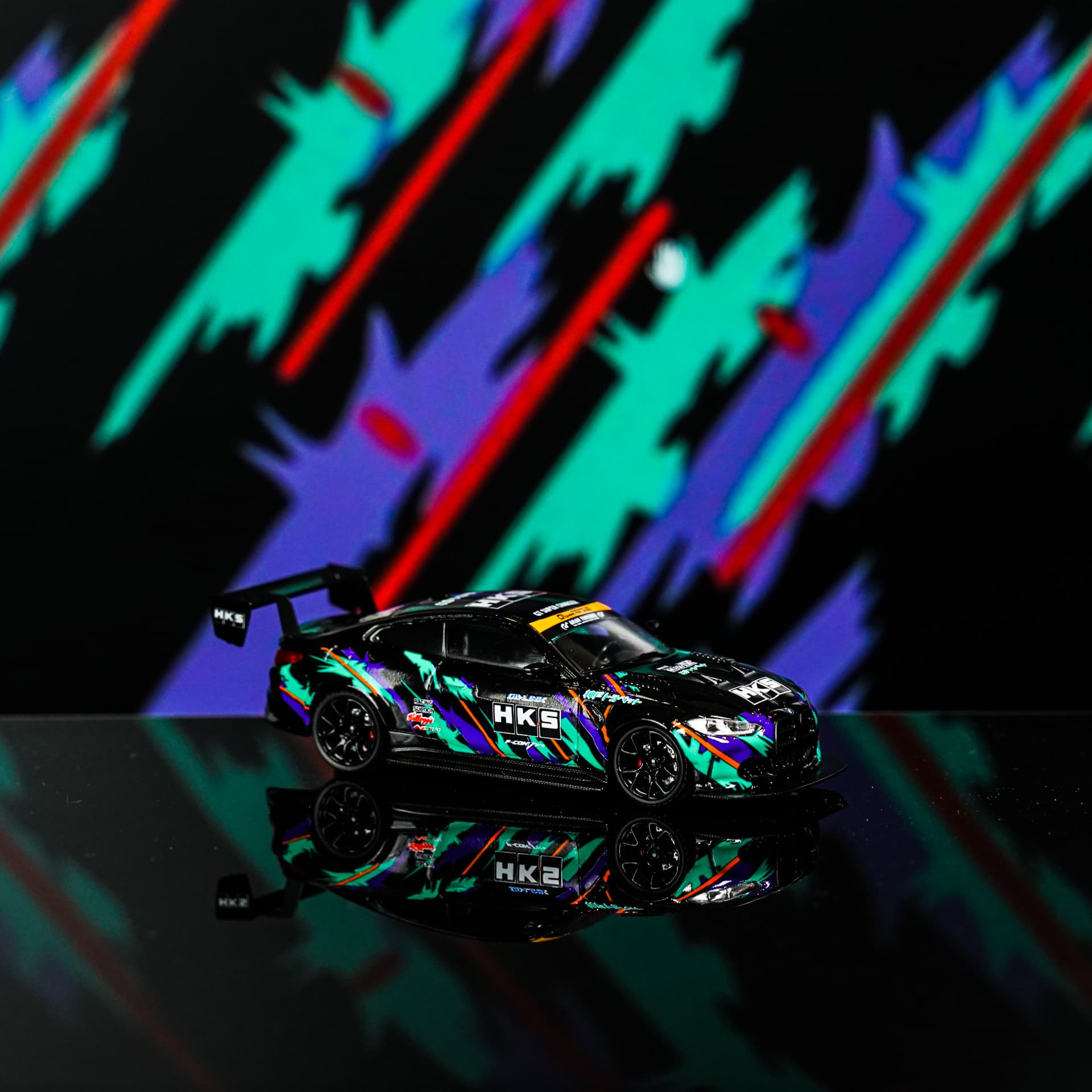 BMW M4 HKS TimeMicro - model 1:64 - miniatura 1