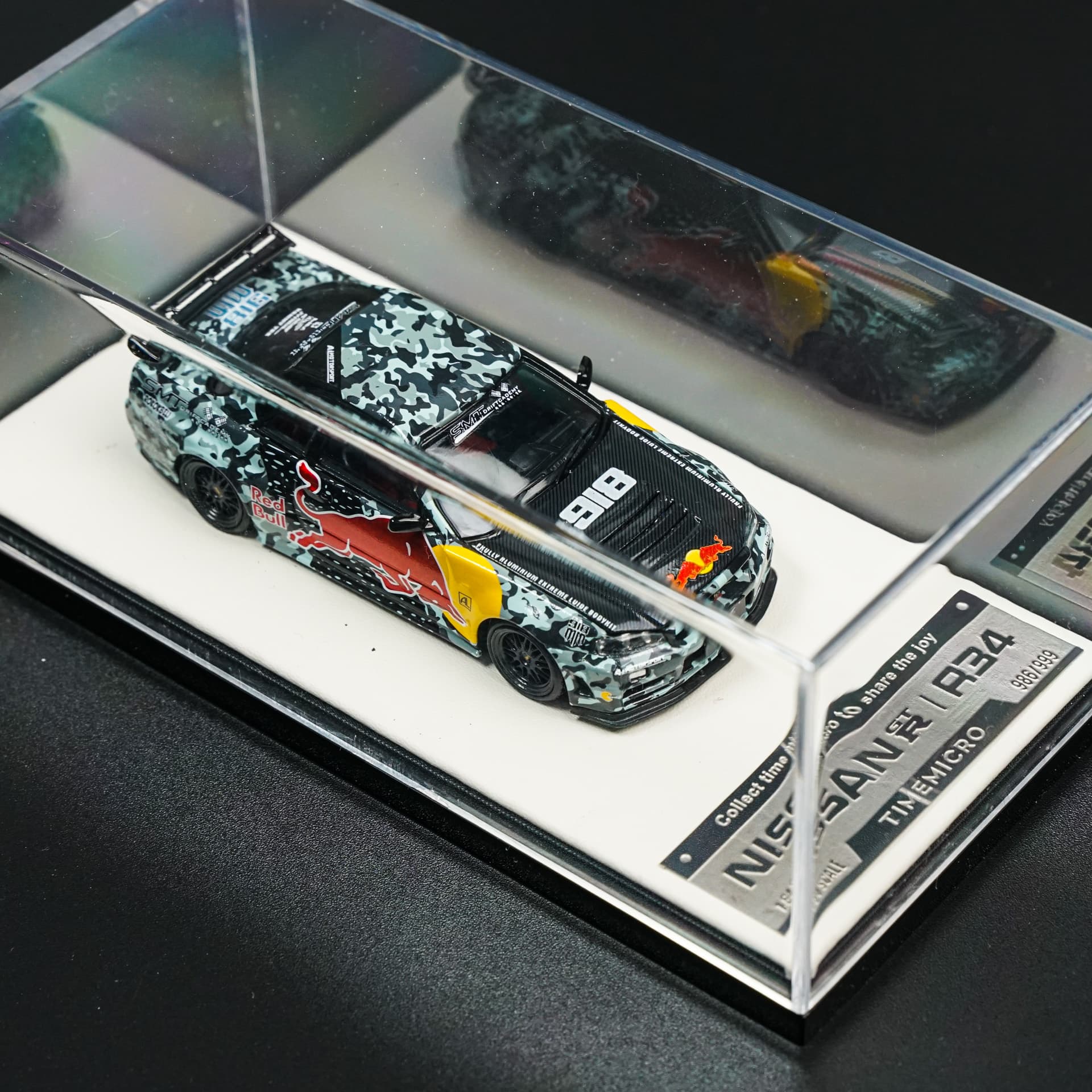 Nissan GT-R R34 Red Bull Camo TimeMicro - model 1:64 - miniatura 3