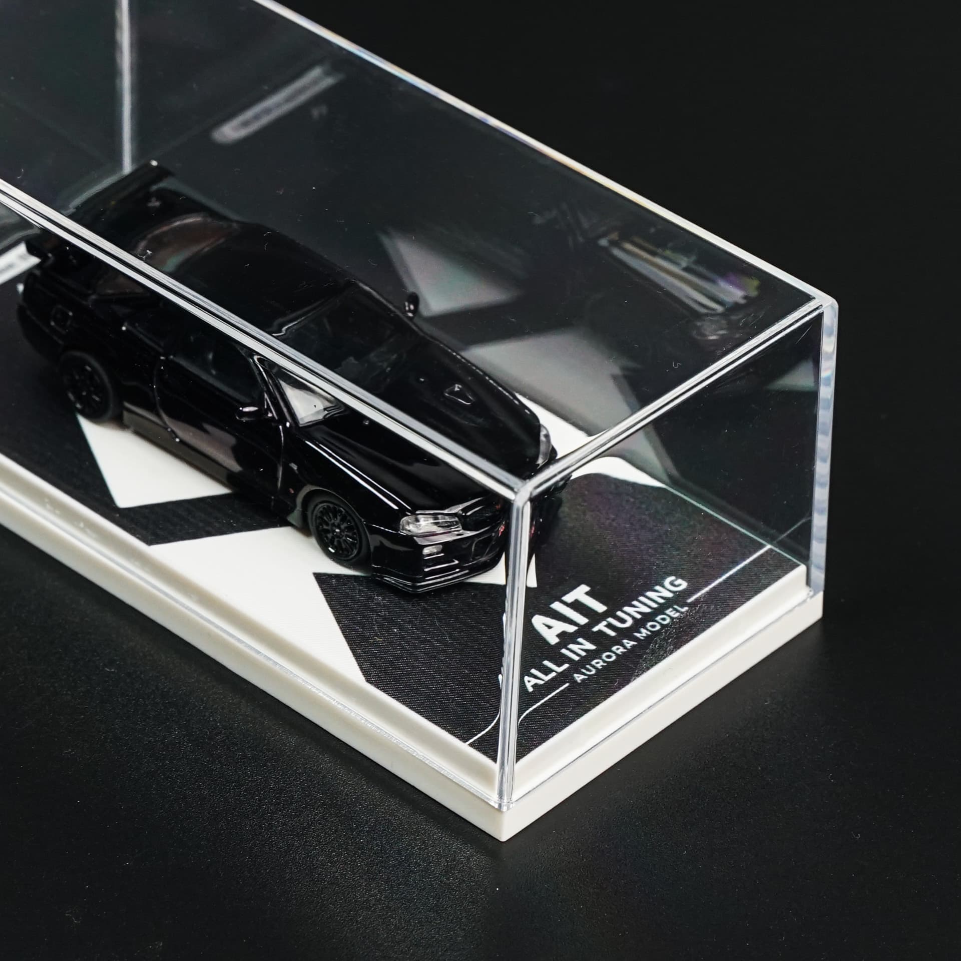 Nissan GTR 34 Black Aurora Model - model 1:64 - miniatura 3