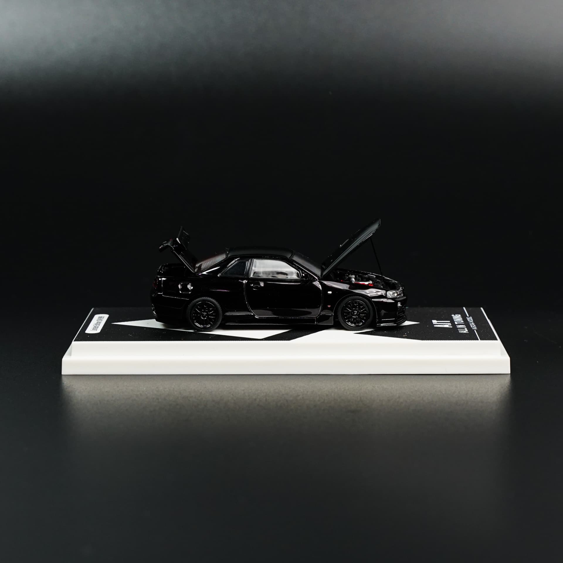 Nissan GTR 34 Black Aurora Model - model 1:64 - miniatura 5