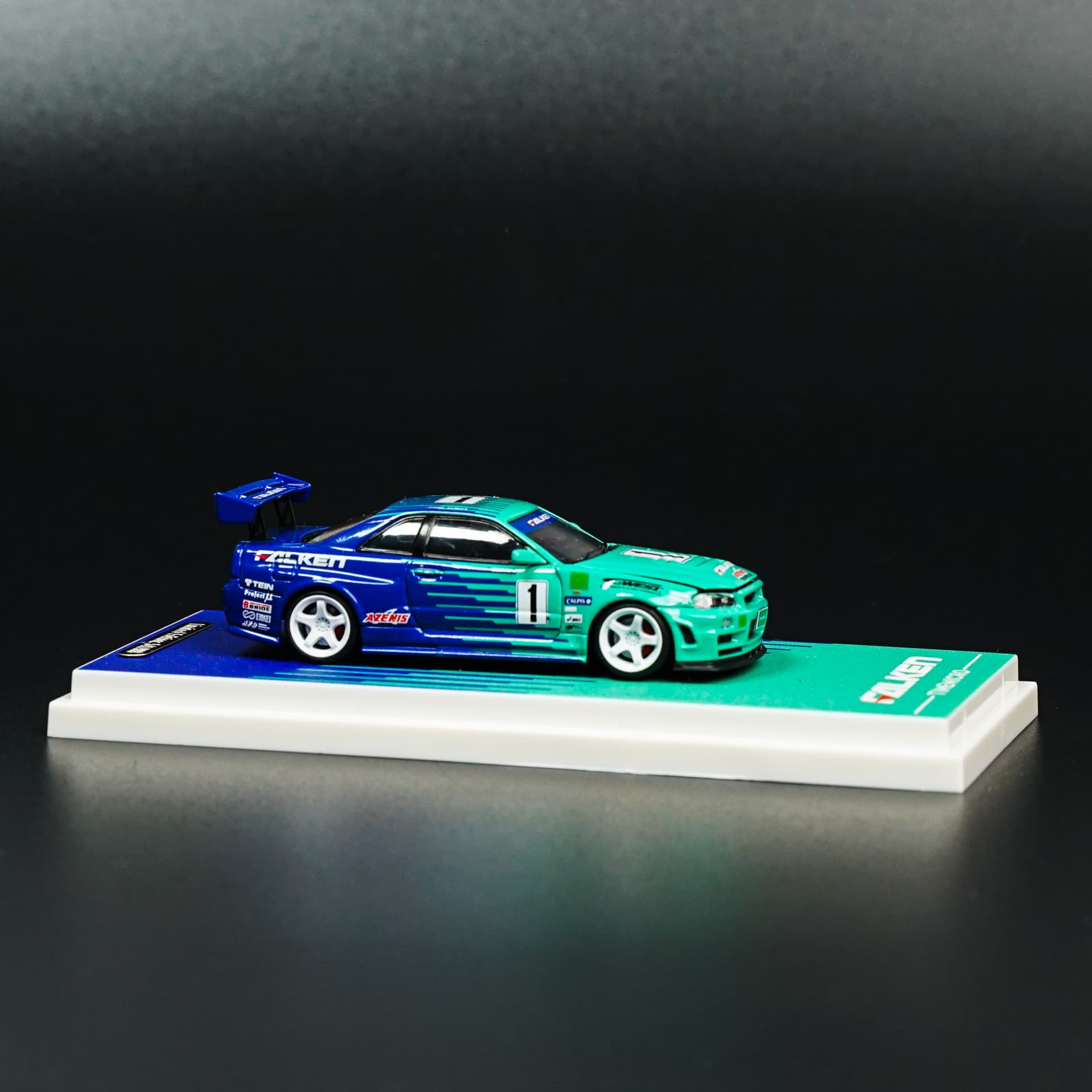 Nissan GTR 34 Falken TimeMicro - model 1:64 - miniatura 2