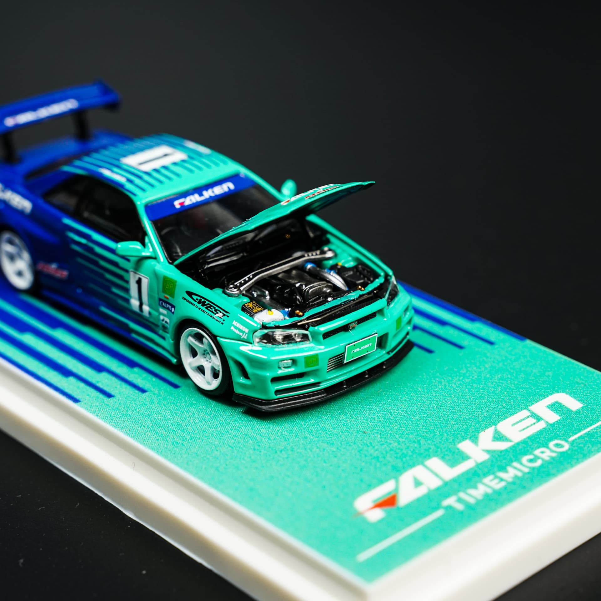 Nissan GTR 34 Falken TimeMicro - model 1:64 - miniatura 3