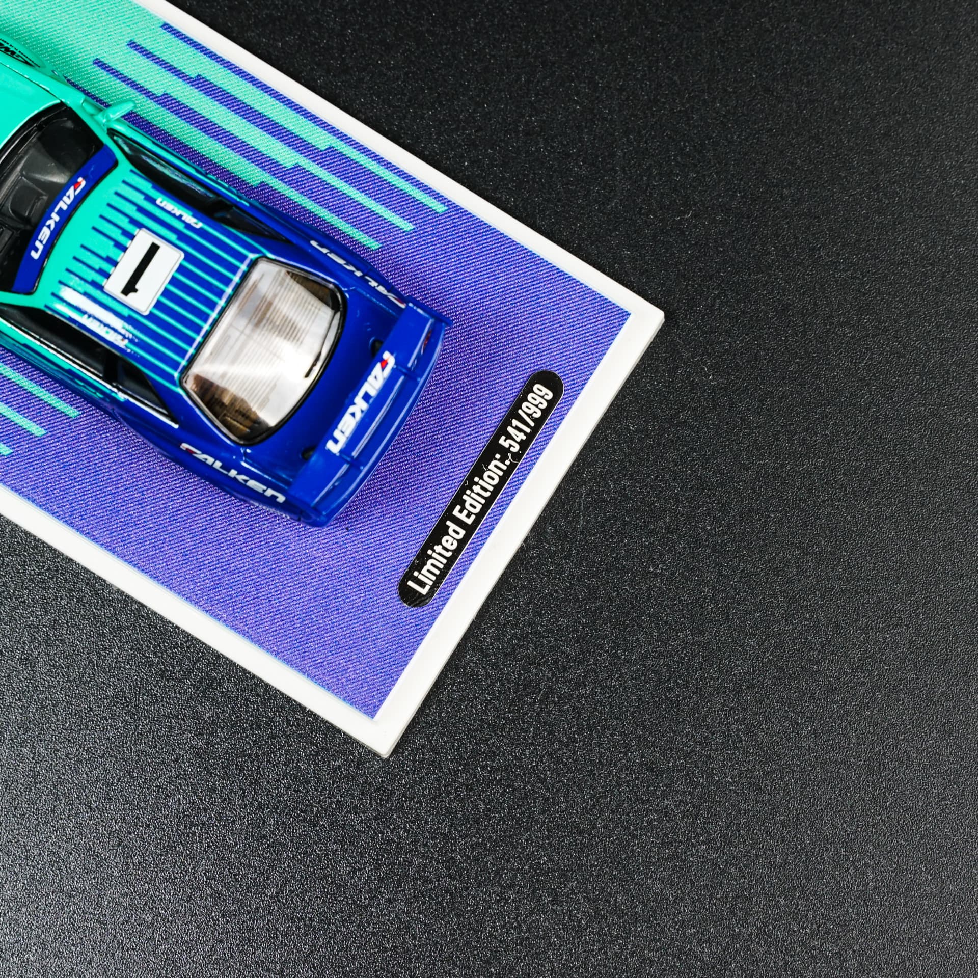 Nissan GTR 34 Falken TimeMicro - model 1:64 - miniatura 5