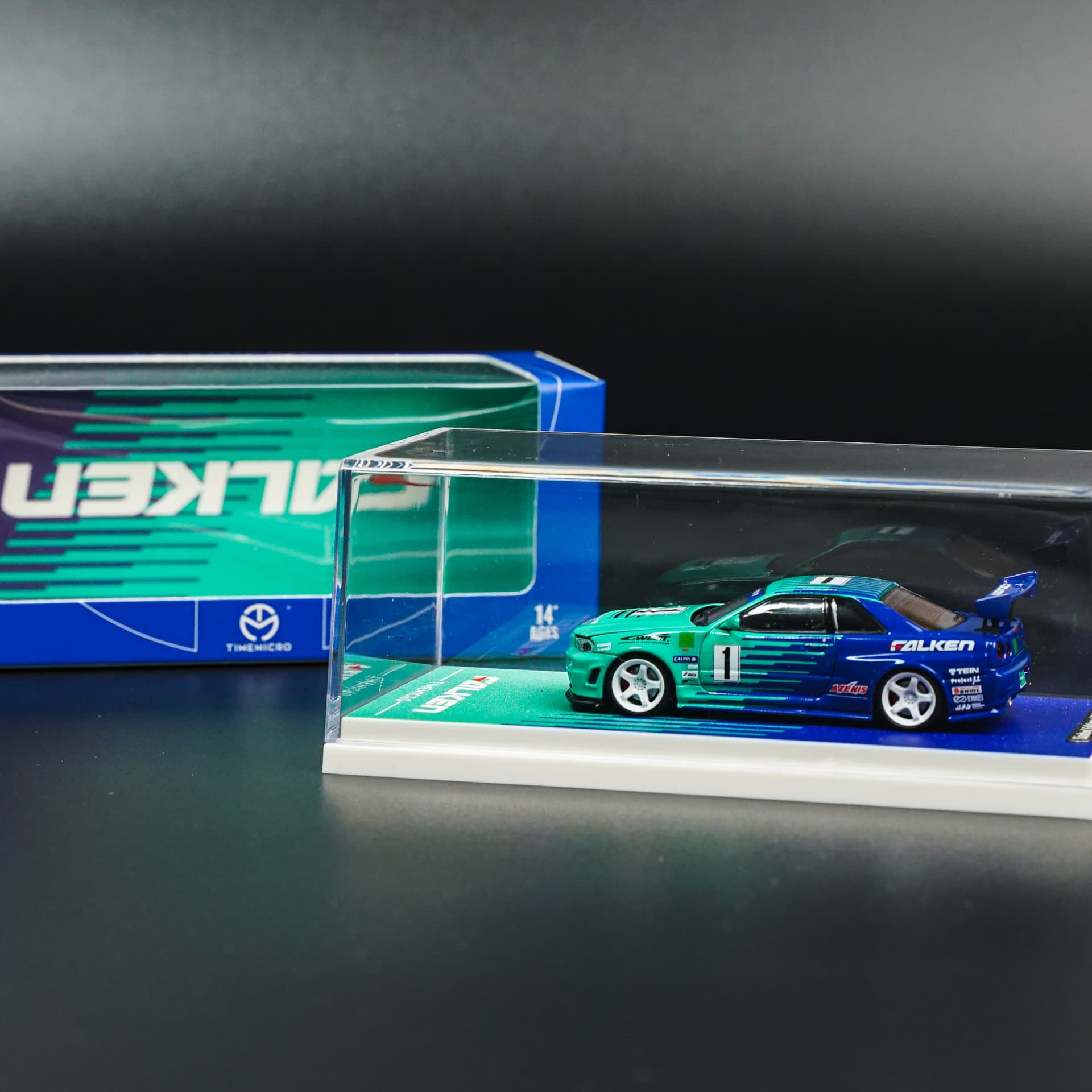 Nissan GTR 34 Falken TimeMicro - model 1:64 - miniatura 6