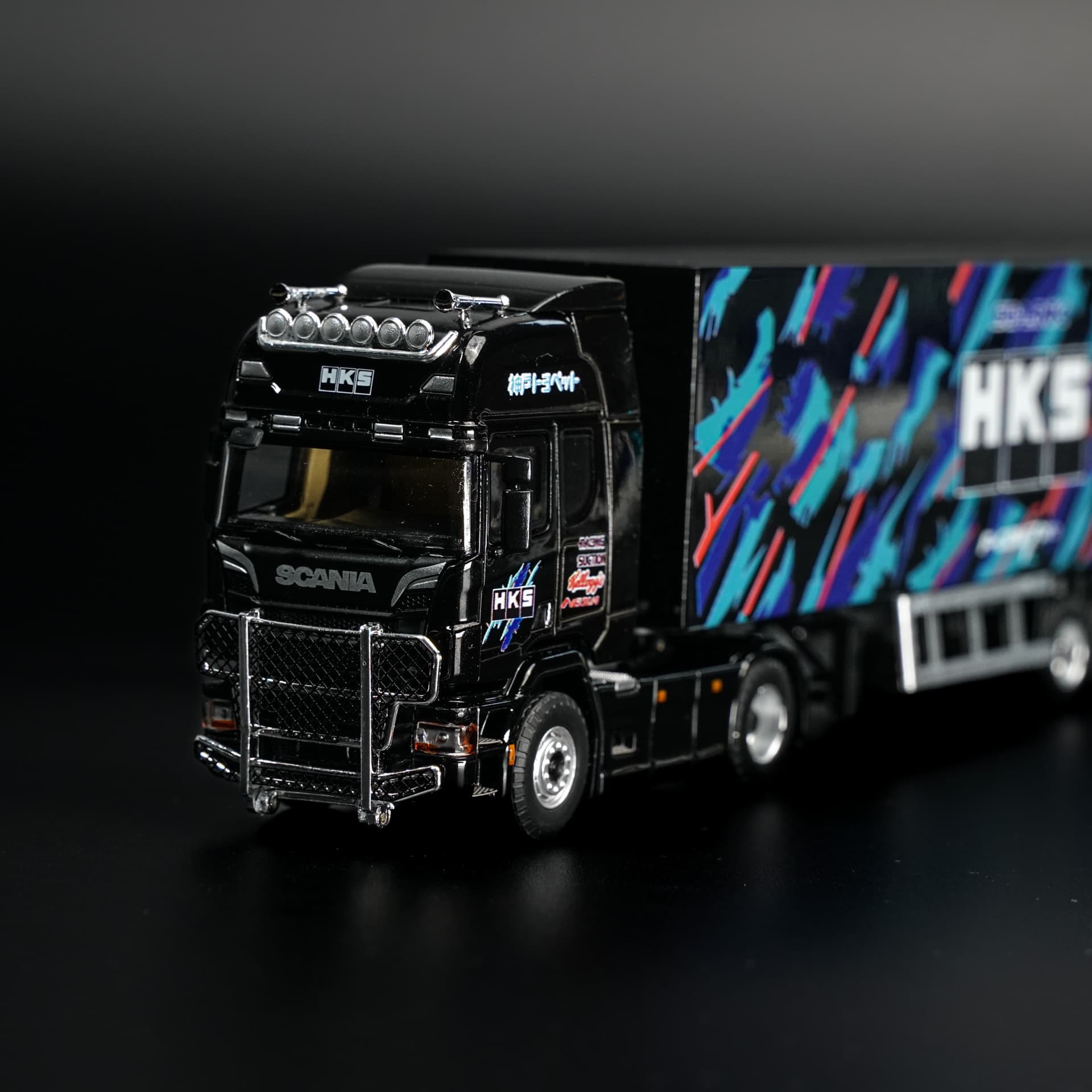 Scania HKS TimeMicro - model 1:64 - miniatura 1