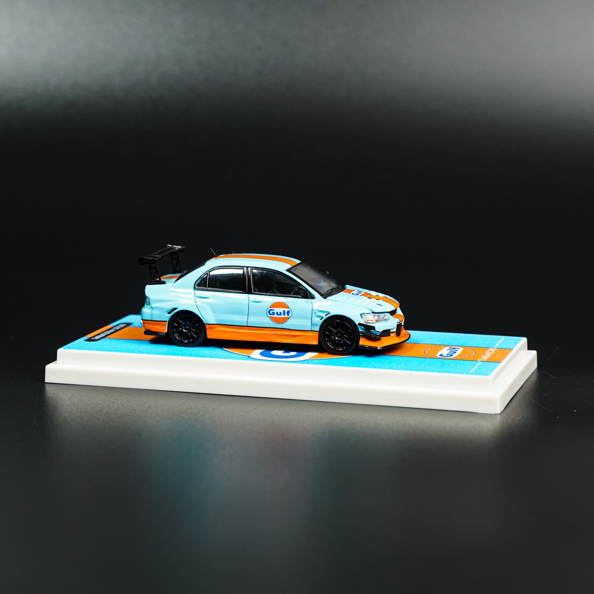 Mitsubishi Lancer Evo IX Gulf TimeMicro - model 1:64 - miniatura 2
