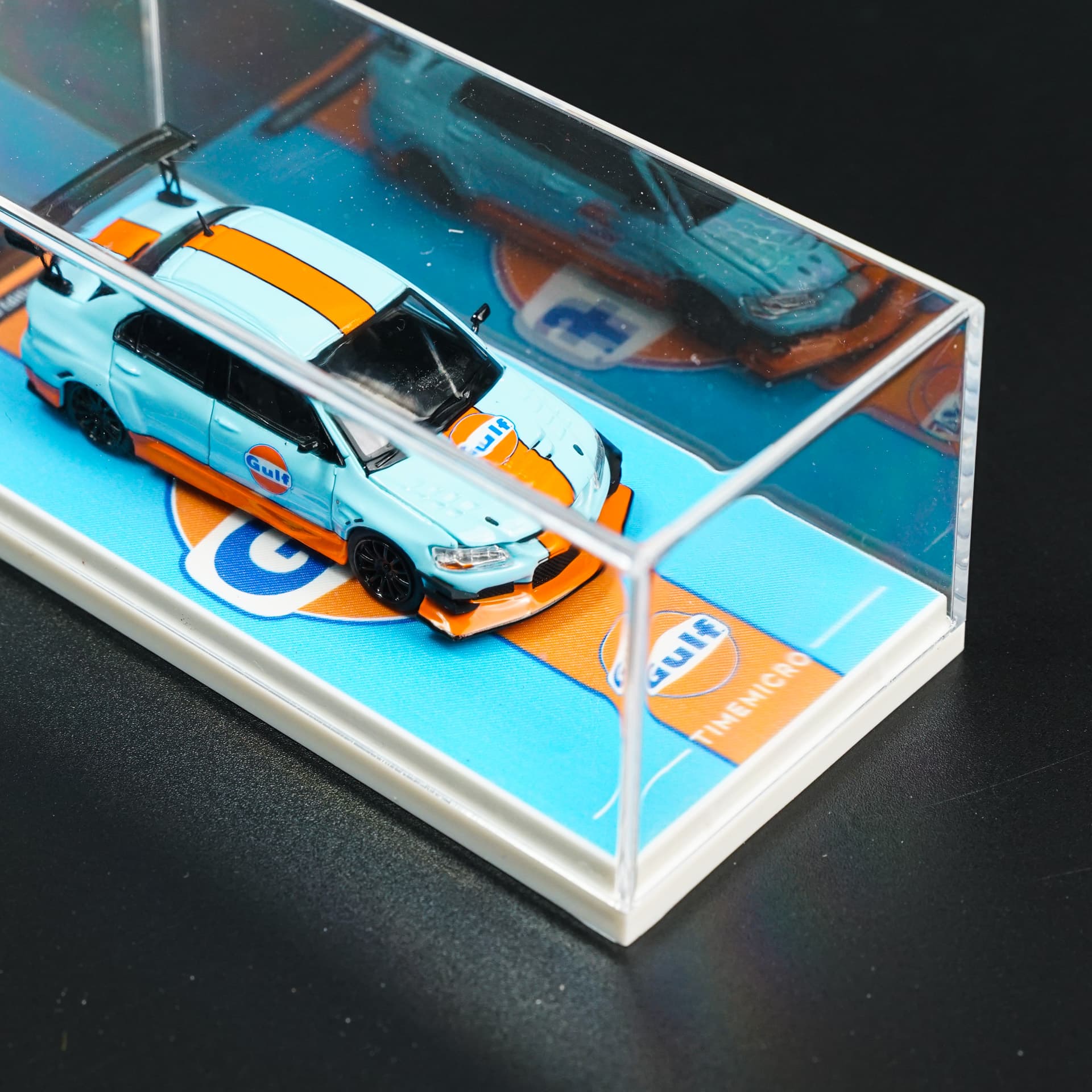 Mitsubishi Lancer Evo IX Gulf TimeMicro - model 1:64 - miniatura 3