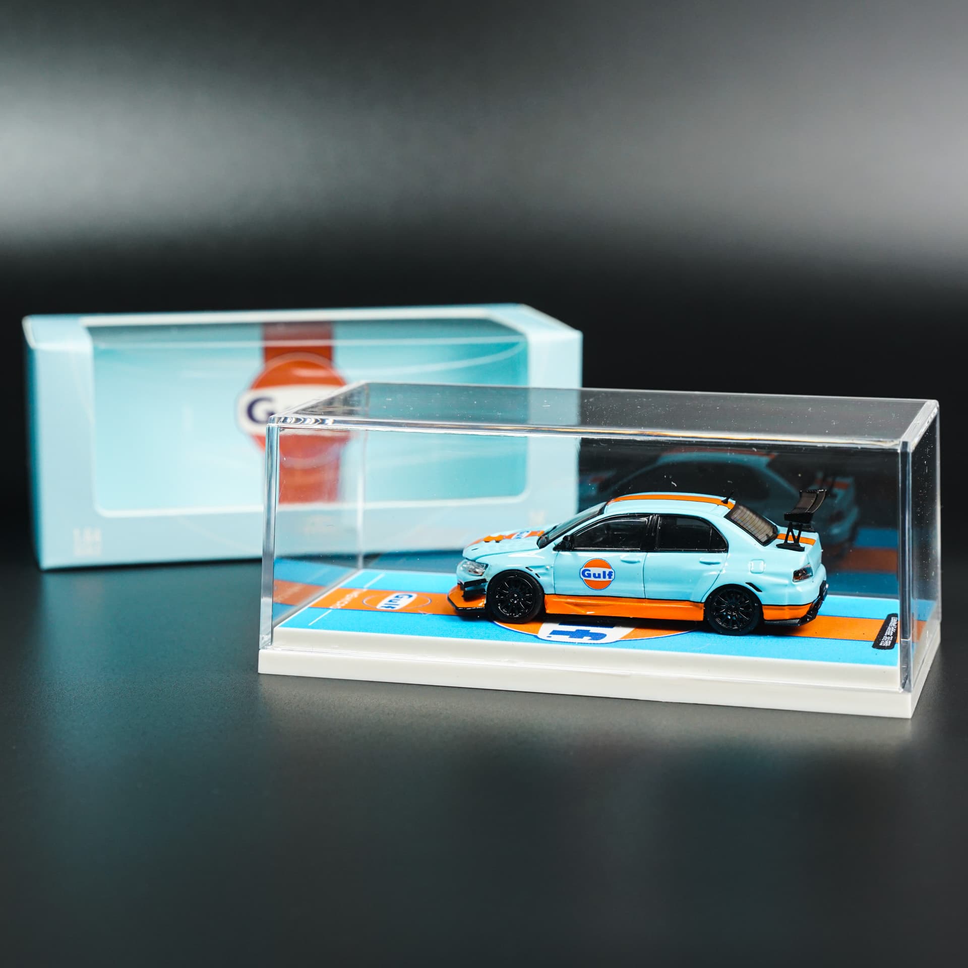 Mitsubishi Lancer Evo IX Gulf TimeMicro - model 1:64 - miniatura 5