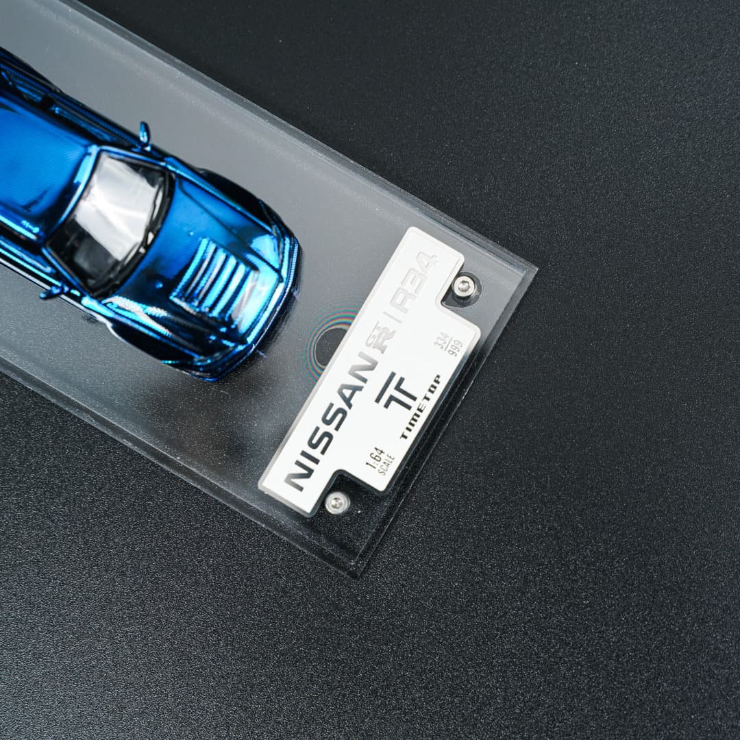 Nissan GTR R34 Blue Carbon TimeTop - model 1:64 - miniatura 5
