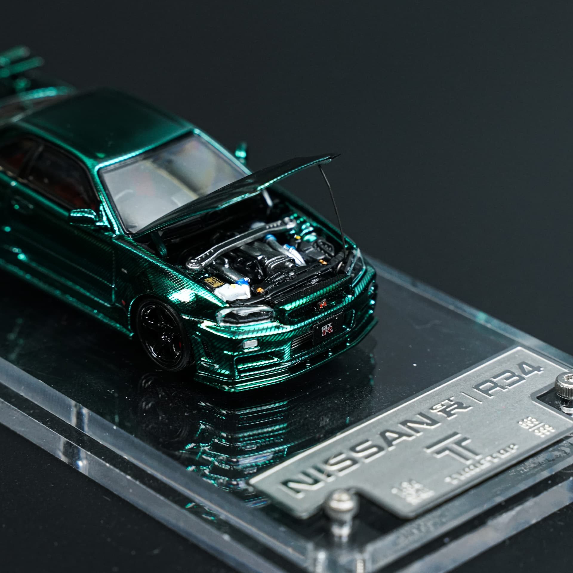 Nissan GTR R34 Green Carbon TimeTop - model 1:64 - miniatura 3
