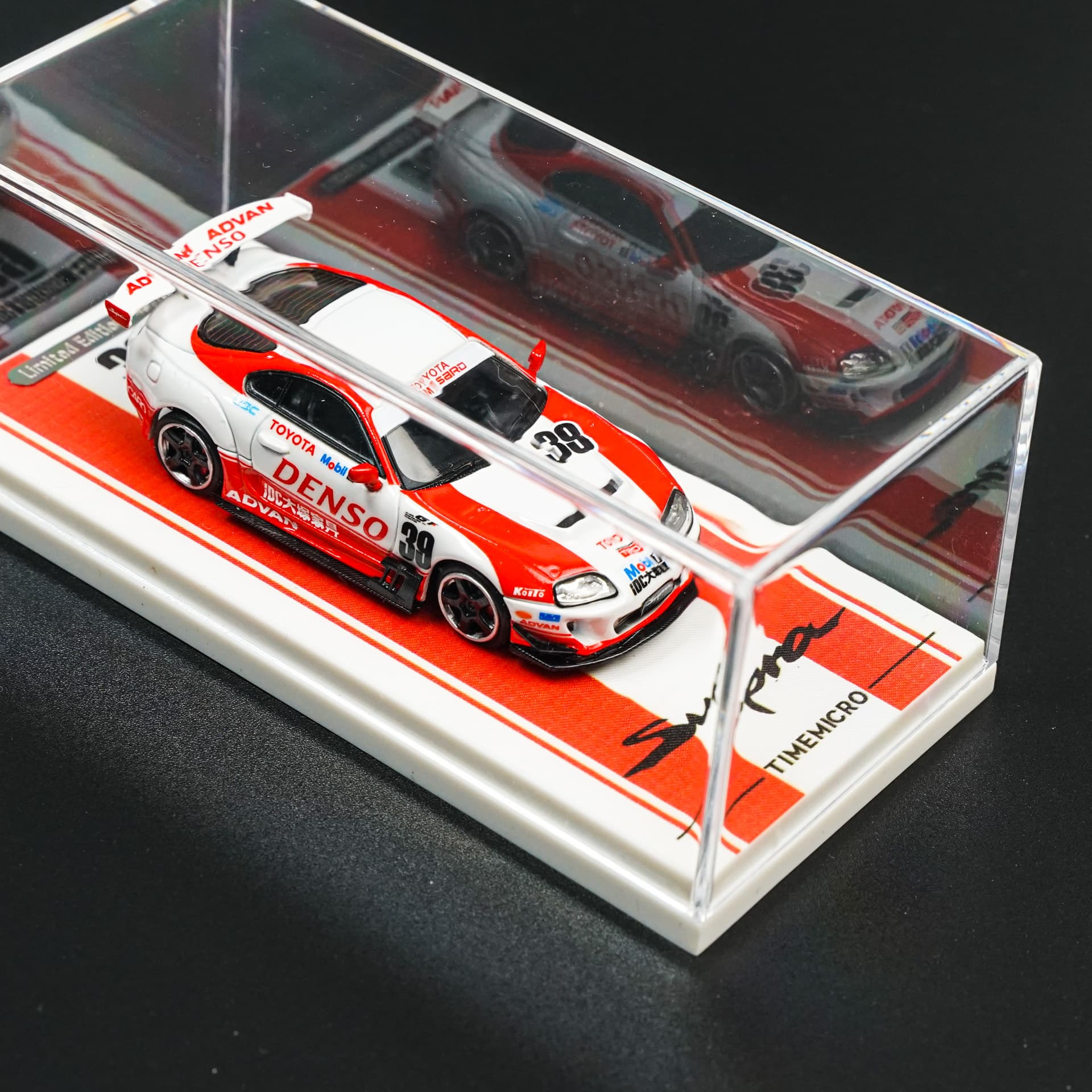 Toyota Supra MK4 Denso TimeMicro - model 1:64 - miniatura 3